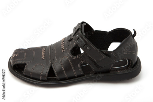 Black sandals on white