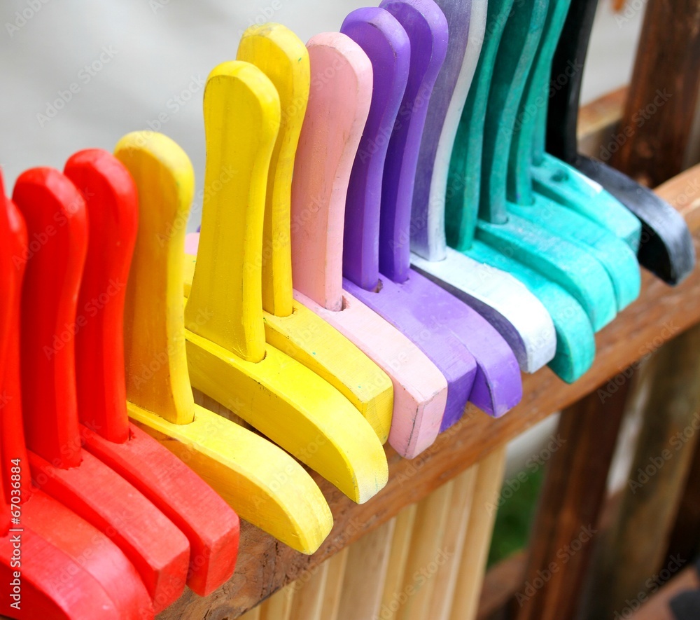 colored wooden toy swords for sale for the happiness of children