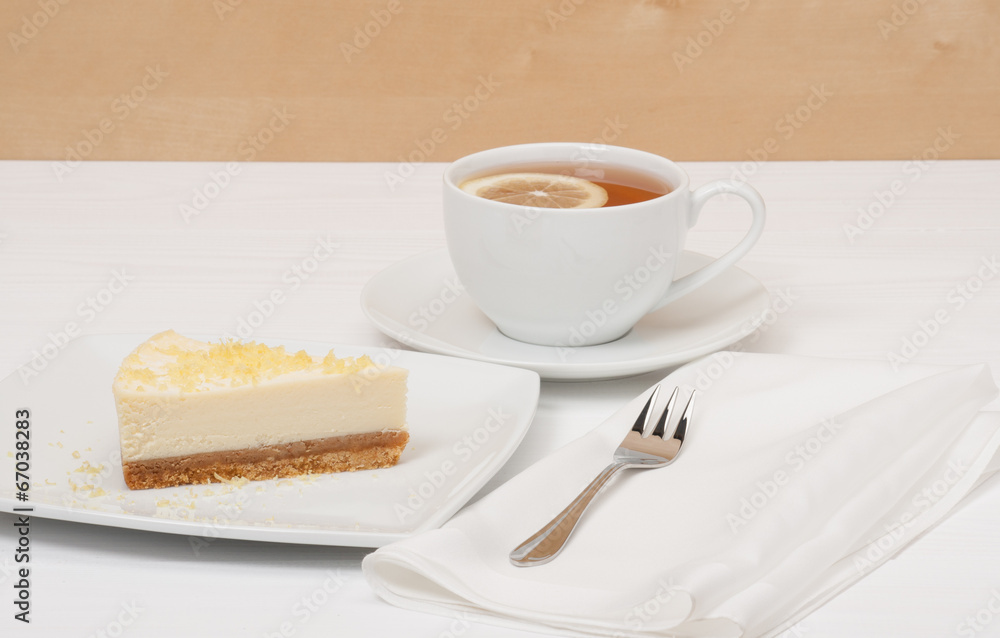 Cheese Cake With Lemon Zest. Tea With Lemon Slice Cheese Cake With Lemon Zest. Tea With Lemon Slice