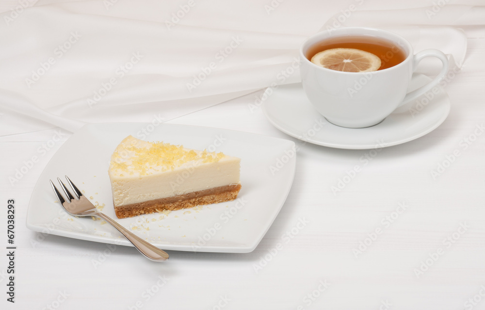 Cheese Cake With Lemon Zest. Tea With Lemon Slice Cheese Cake With Lemon Zest. Tea With Lemon Slice