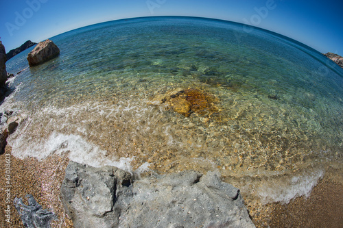 Unusual vivid colors of Palepchori beach, Milos, Greece photo