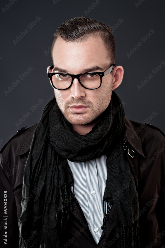 Obraz premium handsome young fashion man wearing scarf