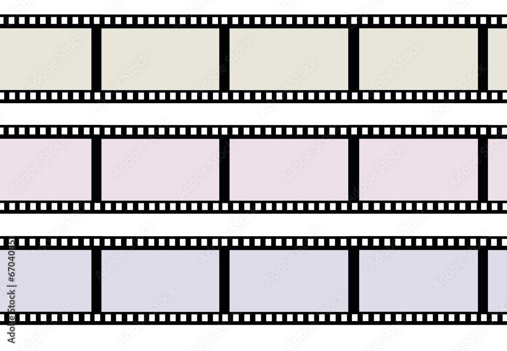 Ribbons of movie film isolated on white