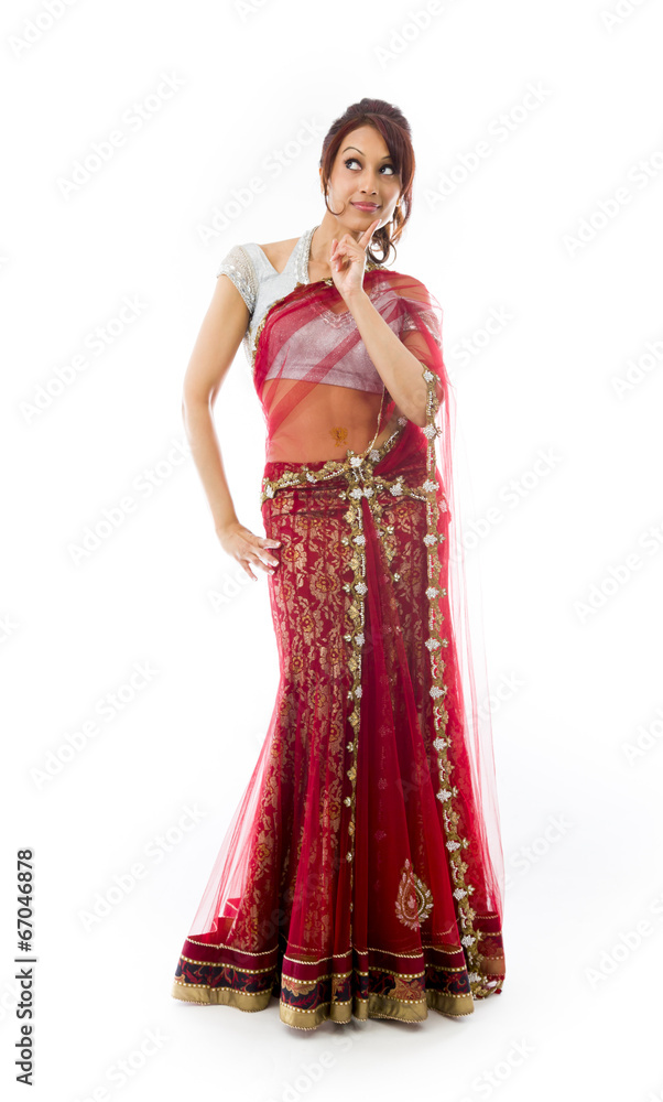 Young Indian woman looking sideways and thinking Young Indian woman looking sideways and thinking