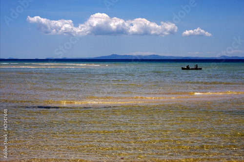 boat near the coastline photo