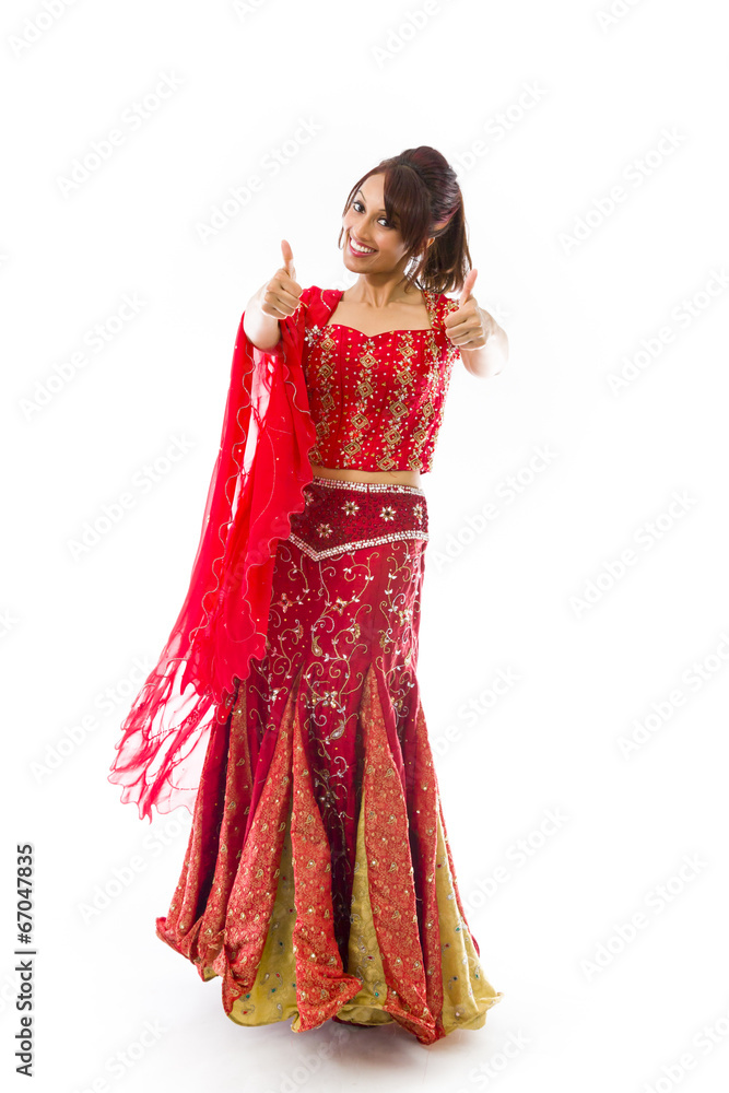 Indian young woman showing thumbs up from both hands isolated on