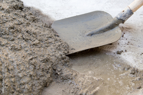 cement solution with a shovel photo