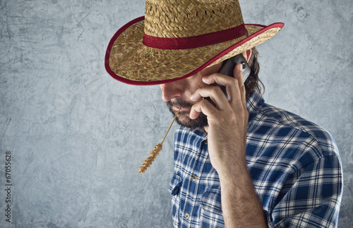 Farmer with cowboy straw hat