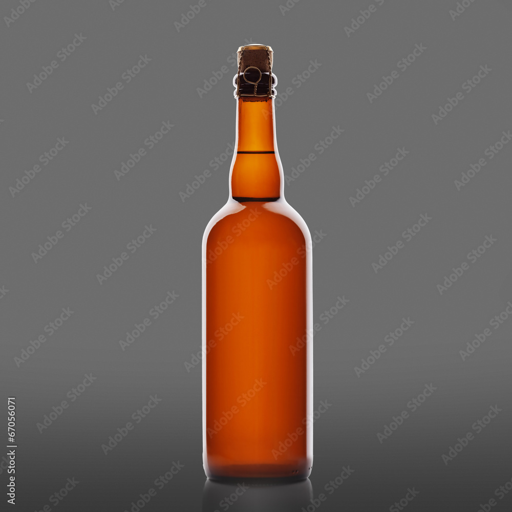 dark glas beer bottles and cork with golden wire dark glas beer bottles and cork with golden wire