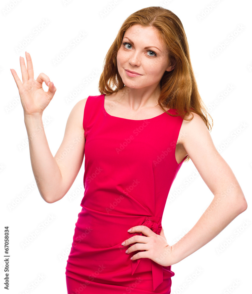 Woman is showing OK sign Woman is showing OK sign