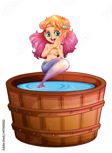 A smiling mermaid in the barrel
