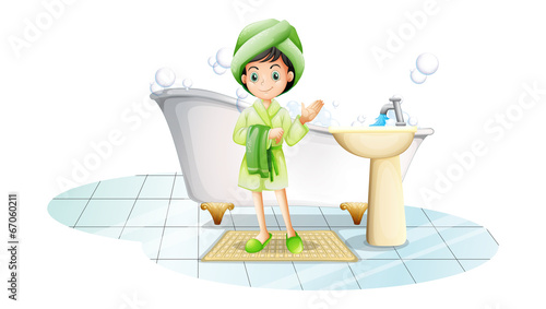 A young lady taking a bath with a green towel
