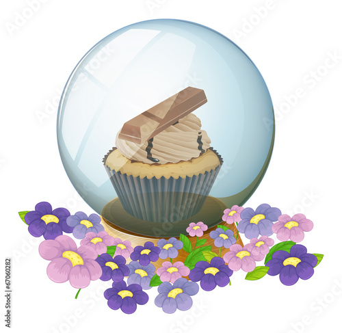 A crystal ball with a cupcake inside