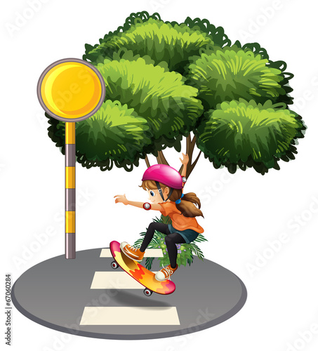 A female skateboarder at the street