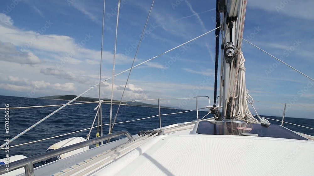 Yacht sailing in Croatia, during summer and calm sea Yacht sailing in Croatia, during summer and calm sea