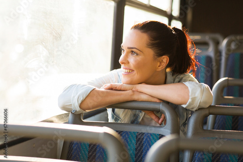 female commuter daydreaming on bus