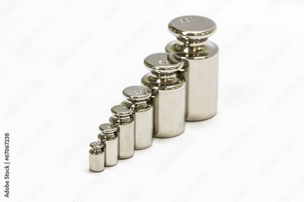calibration weight set isolated on white background calibration weight set isolated on white background
