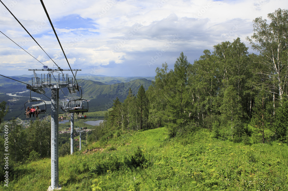Ski lift on a background summer Altai Mountains.