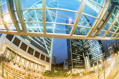 Photography the light trails on the modern building background in hongkong c