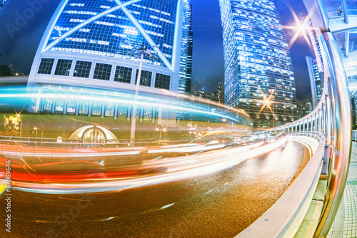 Photography the light trails on the modern building background in hongkong c