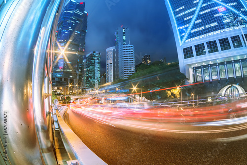 Photography the light trails on the modern building background in hongkong c