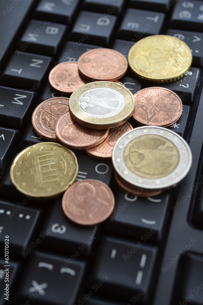 Coins on the keyboard Coins on the keyboard