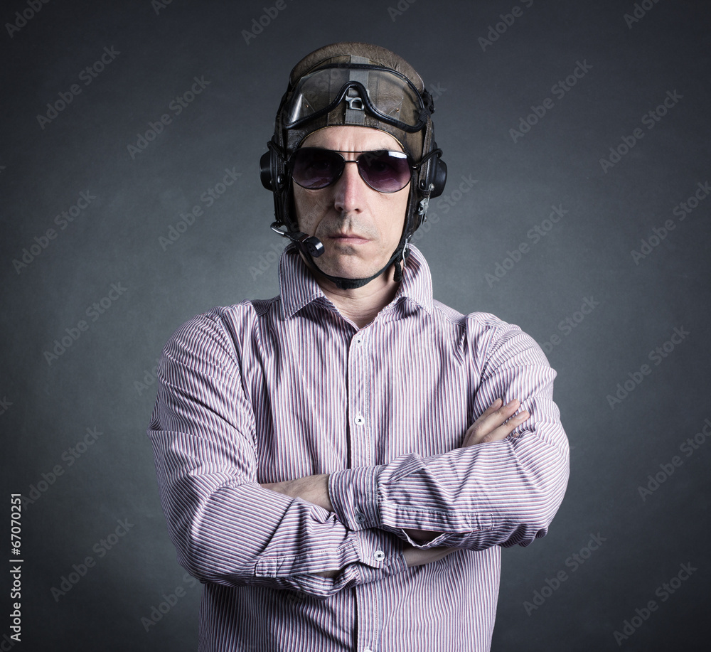 Portrait of a businessman wearing a helmet aviator. Portrait of a businessman wearing a helmet aviator.