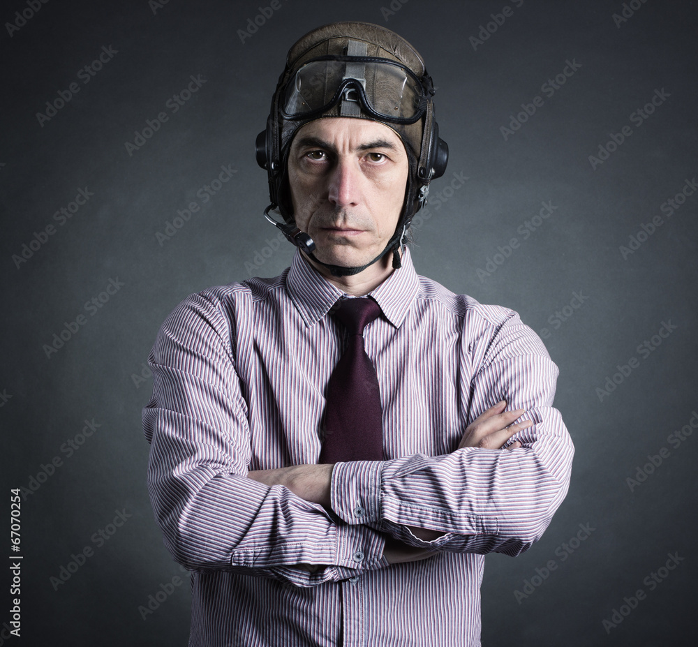 Portrait of a businessman wearing a helmet aviator. Portrait of a businessman wearing a helmet aviator.