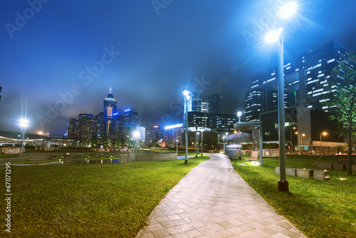 Canvas Print the light trails on the modern building background in hongkong c