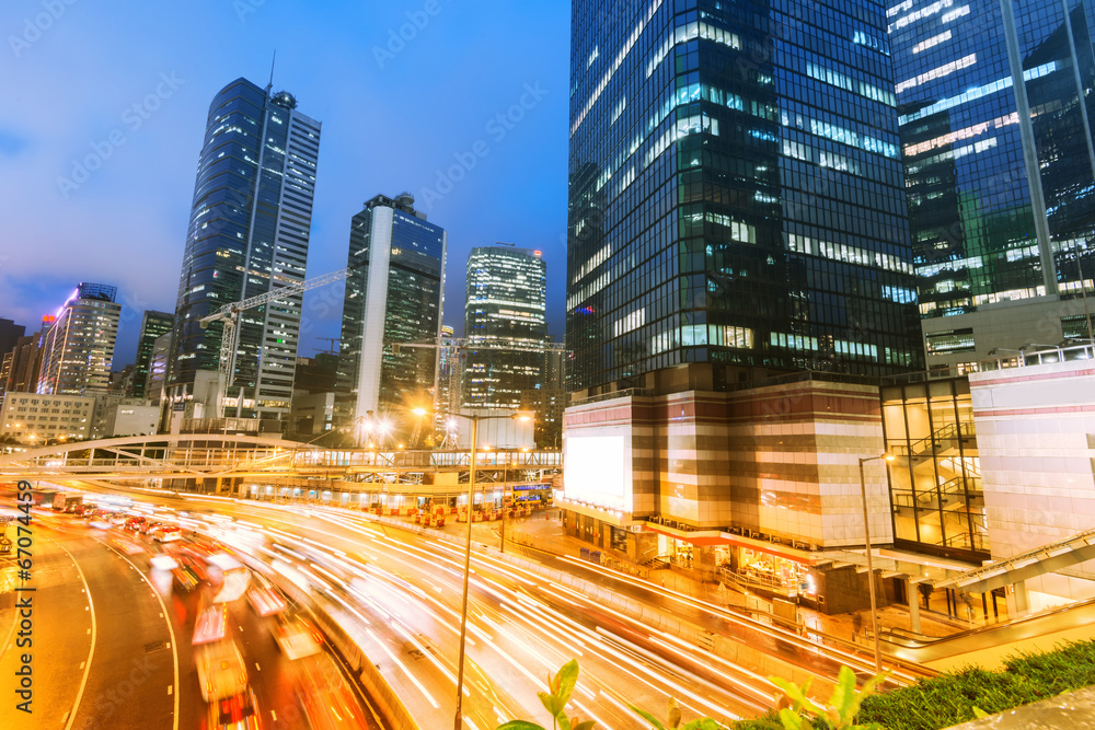 traffic with blur light through city at night