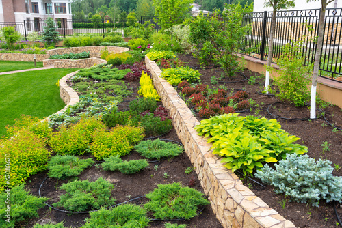 Landscape design in home garden, landscaping of house yard or backyard