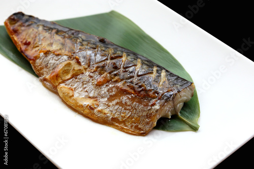 japanese cuisine saba fish grilled with sauce in the white plate