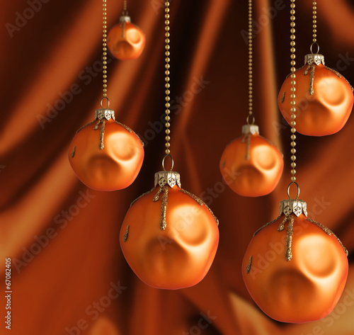Golden Christmas balls with blur shiny background