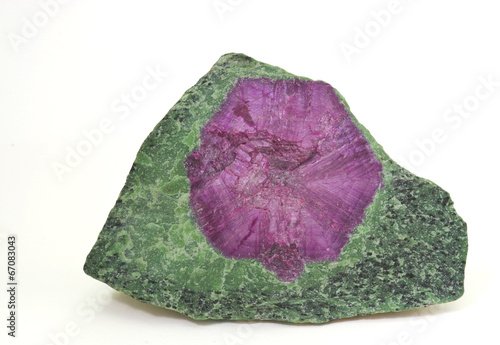 Pink corundum in green zoisite from Tanzania. 20cm across.