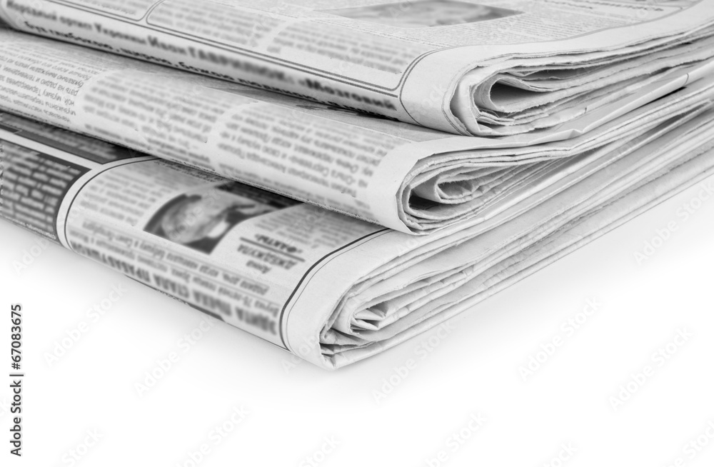 Stack newspapers on white Stack newspapers on white