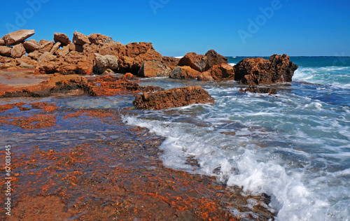 Huge rocks on the coast of the storm sea © Chiffanna
