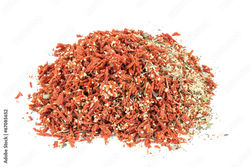 Fototapeta premium Heap of dried tomato with garlic and basil spice