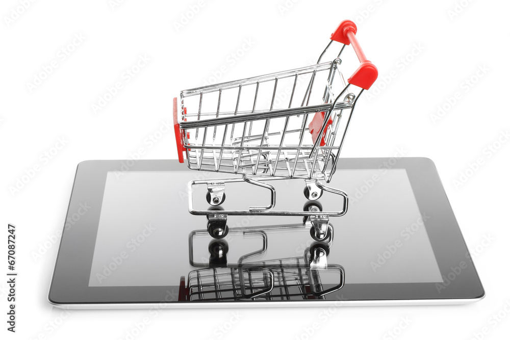 Tablet PC with shopping cart on white background.