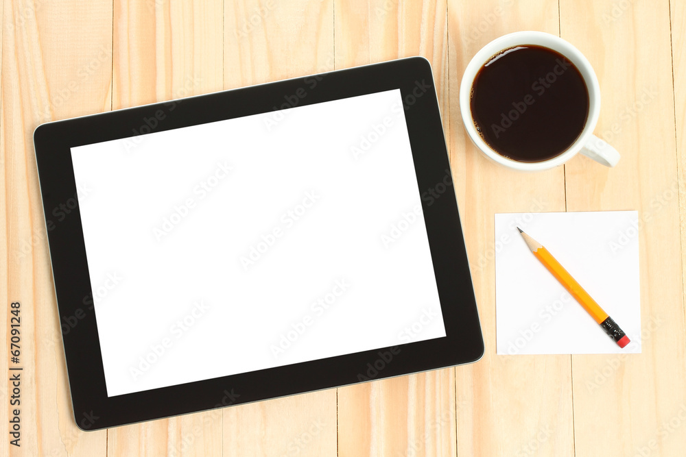 Tablet pc, cup of coffee and paper on wooden background. Tablet pc, cup of coffee and paper on wooden background.