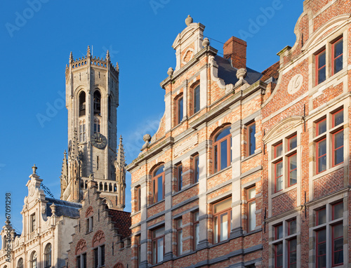Bruges - Facade of tipycal houses with the Belfort van Brugge