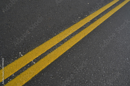 street diagonal yellow lines © sea and sun