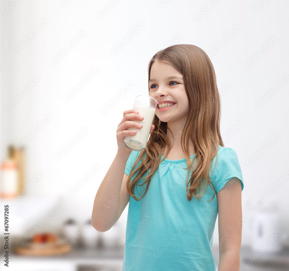smiling little girl drinking milk out of glass smiling little girl drinking milk out of glass