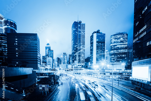 traffic with blur light through city at night