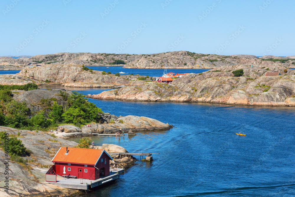 Fototapeta premium Red cottage by the sea