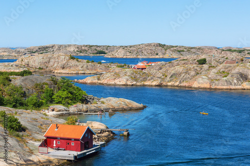 Red cottage by the sea photo