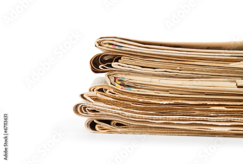 Stack newspapers on white