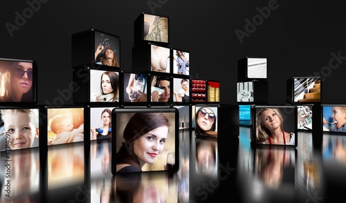 Television screens on black with copy space