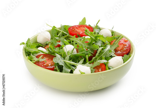 salad from arugula tomatoes and mozzarella