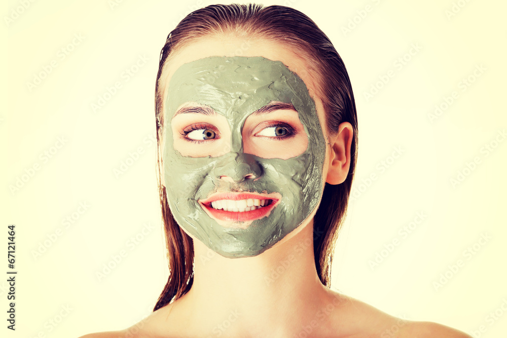 Woman with clay facial mask Woman with clay facial mask