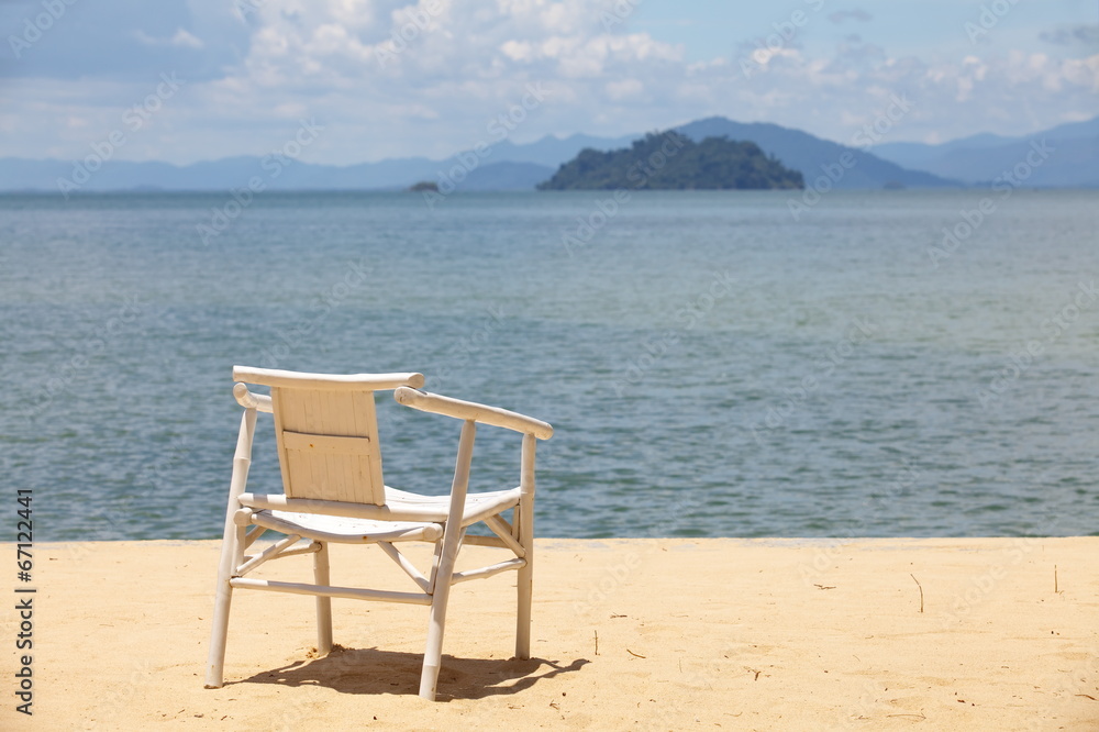 chair on sand beach  Concept for rest, relaxation